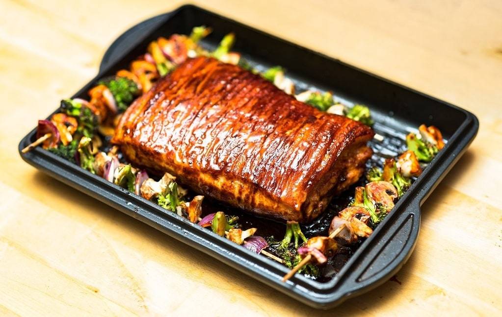 Comment cuisiner facilement un jarret de porc fondant au four ?